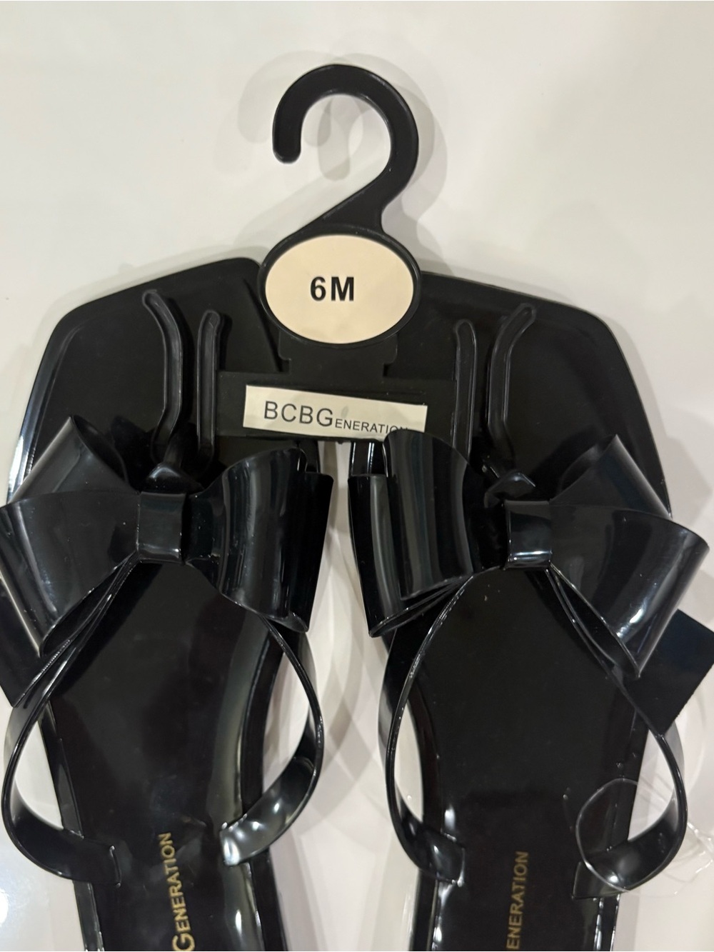 BCBGeneration Black Bow Jelly Sandals